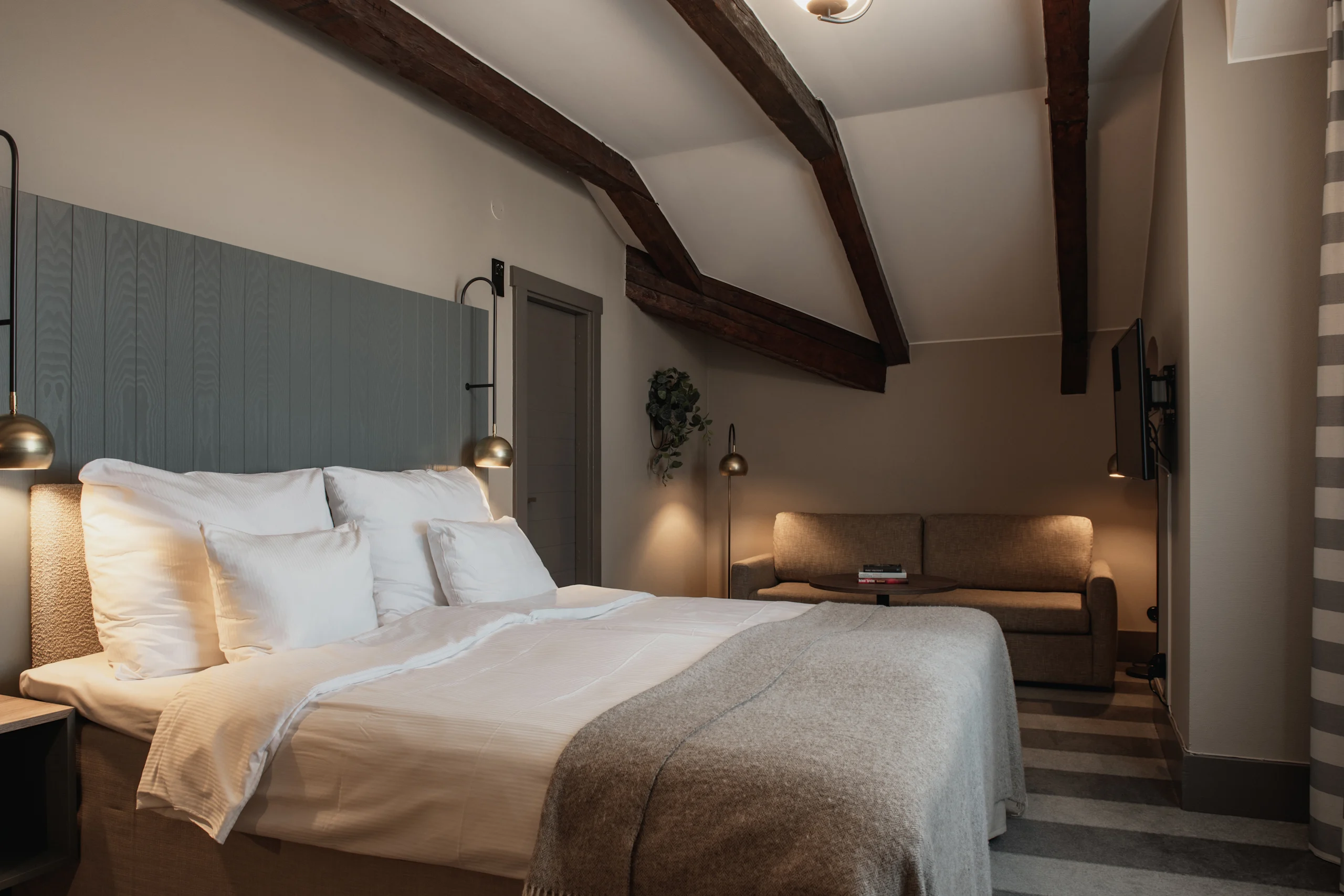 Hotellrum på vinden på Home Hotel Bilan